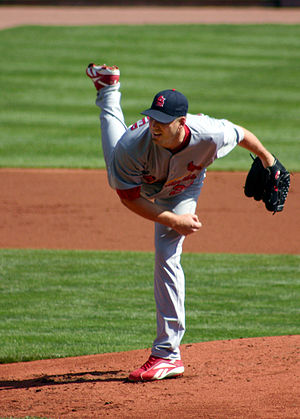 Chris Carpenter completes a pitch for the St. ...